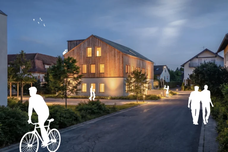 Fotorealistische Außenvisualisierung des modernen Neubaus mit Eigentumswohnungen in Rammersweier bei Offenburg bei stimmungsvoller Abendbeleuchtung.