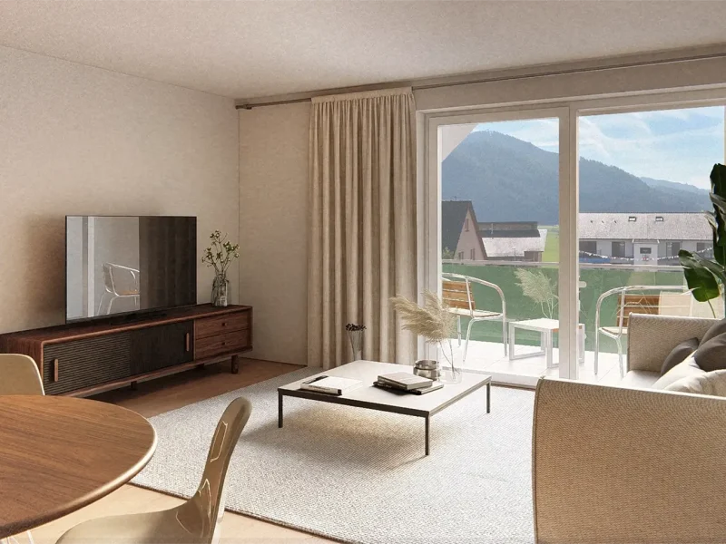 Helles Wohnzimmer einer modernen Wohnung in Fischerbach mit großem Fenster, gemütlicher Sitzecke, Holz-Esstisch und Zugang zu einem Balkon mit Blick auf die Berge.